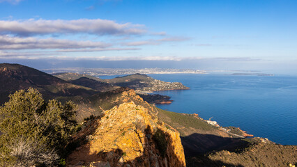 Evening view from Massif de 'Esterel mountains to Cannes. Coastline of French Riviera, Cote d'Azur in France. Famous tourist destination at mediterranean sea.