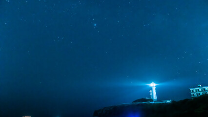lighthouse and stars