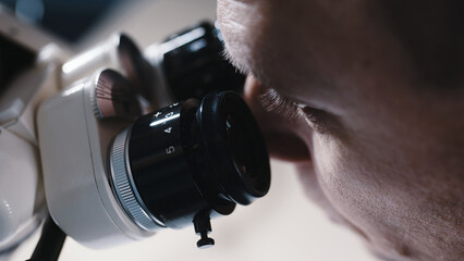 A male doctor performs a high-precision operation. Femtolaser cataract surgery. An ophthalmic...