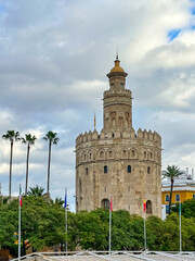 Medieval building known as Tower of Gold in the riverbank of the Guadalquivir River, Seville, Spain