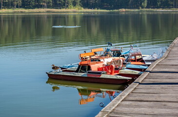 boats catamarans on the lake