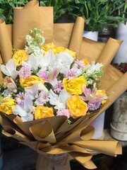 basket with yellow rose  flowers