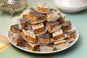 Plate with white and brown Moroccan marbled chocolate cookies close up