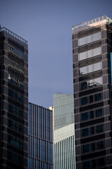 Fototapeta na wymiar The different blue-toned glass windows of the Jakarta skyscrapers