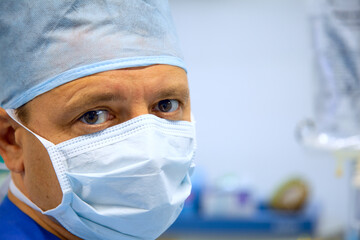 Mature male surgeon in operation room - 745202892