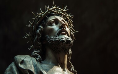 A statue depicting Jesus with a crown of thorns on his head, symbolizing his suffering and crucifixion