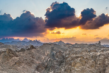 Dramatic wide Sunset panorama over Red Sea Hills mountain chain and Sahara desert. Sharp mountain...