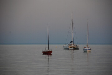 Fototapeta premium fishing boats at sunset