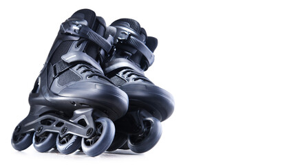 A pair of black inline skates isolated on white background