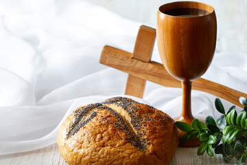 Cross, chalice with wine and bread, Last Supper and Passion of Christ concept
