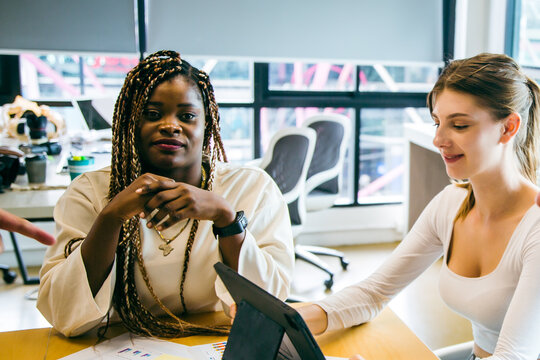 Professional diverse business people having collaboration team meeting in an office, technology and workers, men or employees with touchscreen planning sales, research or financial strategy in company