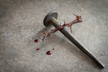 Cross made of old nail and thorn, drops of blood. Jesus Christ Crucifixion abstraction, Good Friday, religious background
