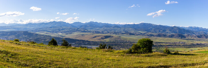 Potskhovi river valley panorama in Samtskhe - Javakheti region with Akhaltsikhe town, Georgia with Lesser Caucasus mountains in the background, summer. © Cleop6atra