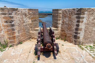 The old guns on the walls of the Portuguese fortress of El Jadida (Mazagan). Morocco, Africa.