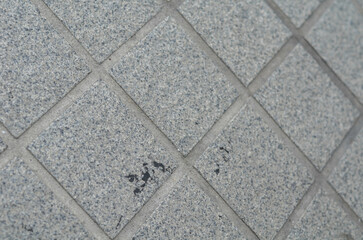 Pavement made of concrete tiles viewed from above as full frame texture, background.