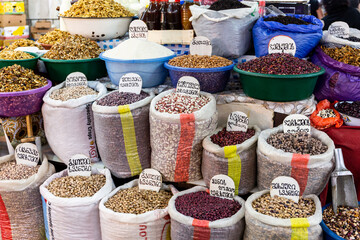 Market stall with bags of Georgian legumes seeds, beans and peas, Kutaisi Central Market (Green...