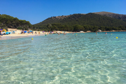 Turquoise sea water in Cala Agulla beach in Mallorca Islands, Spain