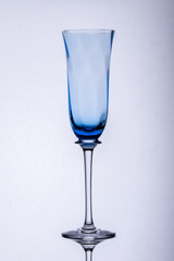 Empty wine glass on white background.
