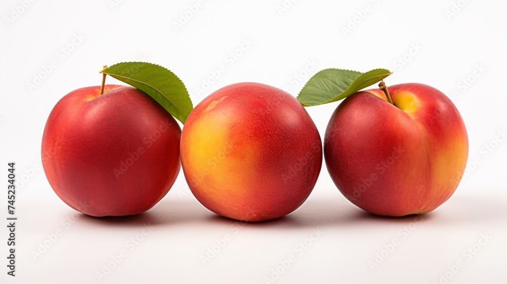 Poster Close-up realistic photo featuring three juicy nectarines on a white background Generative AI