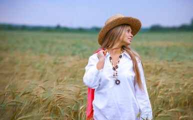 Happy Girl in a Wheat Field - 745237447