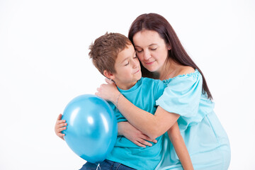 Happy mother with son on a light background - 745237627