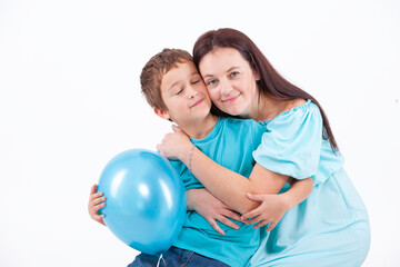 Happy mother with son on a light background - 745237638