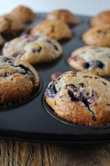 Sweet Chocolate and Berry Muffins still in their Baking Cups