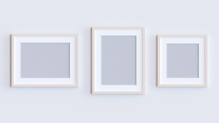 Wooden photo frames mockup. Set collection on white wall, interior decoration. Realistic frame set on the wall.
