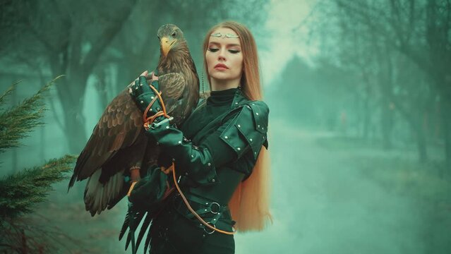 art portrait fantasy woman hugs holding white-tailed eagle wild bird on hand. Elf girl warrior beauty face sexy eyes lips. Lady queen hunter black jacket overalls pants armor, nature dark trees fog 4k