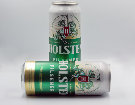 Holsten beer cans closeup against white.