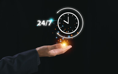 Nonstop service concept. Nonstop business internet technical support work. Man hand show virtual 24-7 clock, worldwide web full-time available contact of service. Always customer service