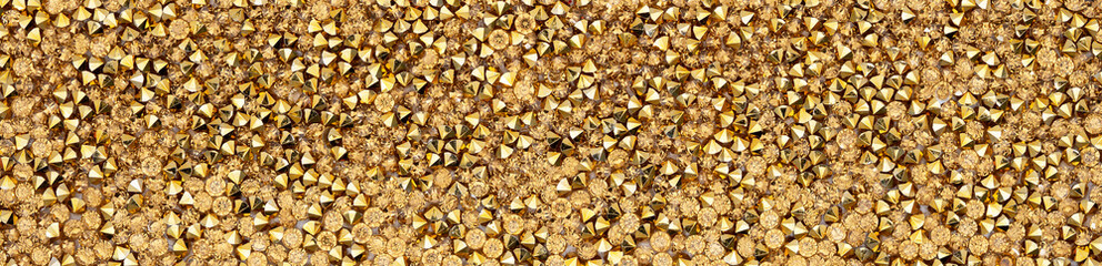 Banner With Shimmering Gold Glitter Texture with Reflective Facets.