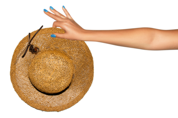 A woman's hand holds a straw hat. On an empty background. PNG