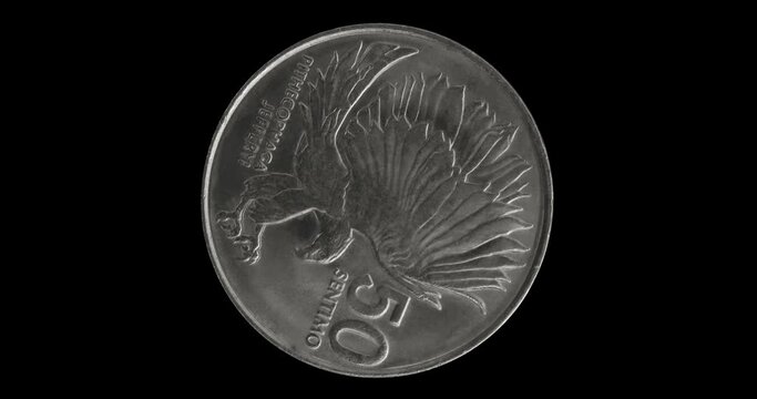Reverse of Philippines coin 50 sentimo 1989, isolated in black background. Seamless animation in 4k resolution video.