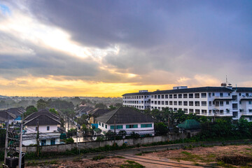 Beautiful golden colorful sunrise over the city panorama Pattaya Thailand.