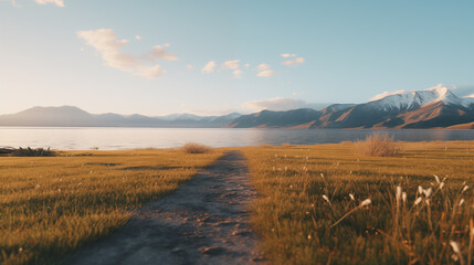 grassy pavement foreground big lake midground, snowy mountain background product display montage
