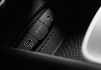 Interior socket block, USB, 12V, 180W of passenger car close-up