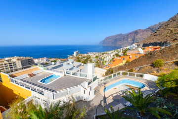 Obraz premium High angle view from above the seaside town of Los Gigantes, on the Canary Island of Tenerife, Spain.