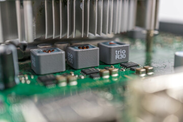 electronic components with chip design, in the style of gray and emerald