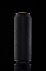a black can of beer on a black background