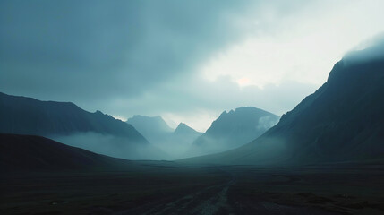 The bold outline of mountain ranges, silhouetted against a fading sky, evoking serene isolation - obrazy, fototapety, plakaty