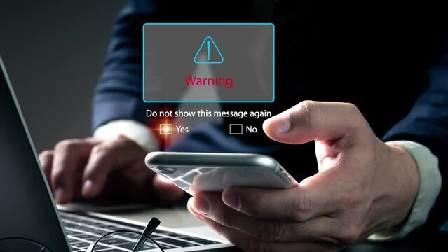 phishing email warning pop-ups, spam email, and network security concept blocking. A businessman sees a warning popup while working on his laptop at home