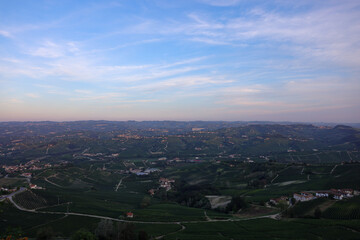 Obraz premium typical piedmontese landscape with small villages and vines in sunrise light