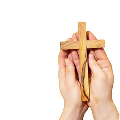 Easter holiday religion card. Isolated female hands hold wooden crucifixion on transparent...