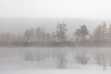 Beautiful autumn landscape with the fog and river . Russia - 745289007