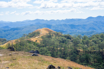 Ta Nang - Phan Dung route with milestone between 3 provinces through grass hills and forests in...