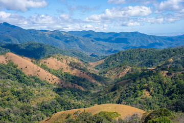 Ta Nang - Phan Dung route with milestone between 3 provinces through grass hills and forests in Song Mao Nature Reserve