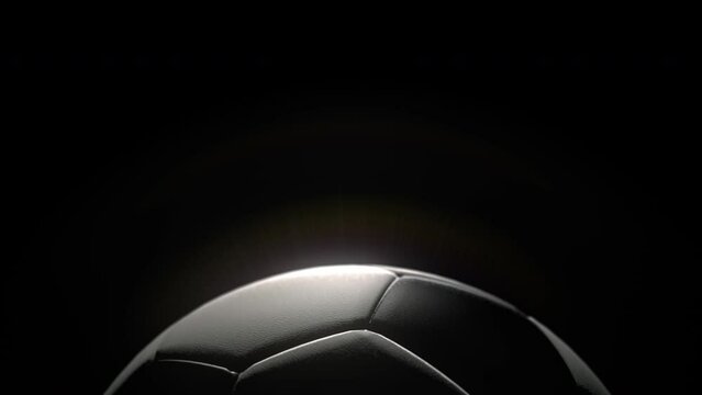 Soccer Ball Bottom Graphic in epic lighting on Black