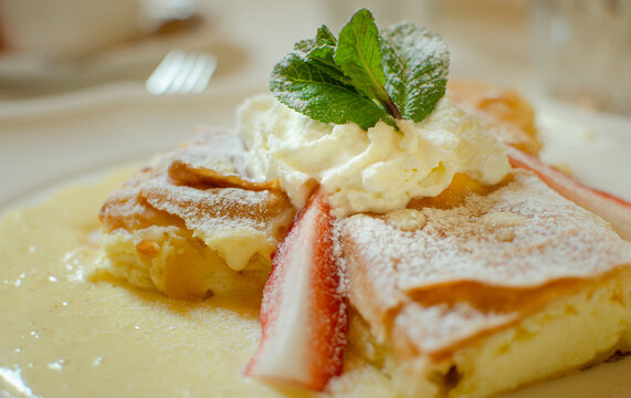 creamiest  cremsnit, cremeschnitte appetizing dessert with vanilla cream and strawberries