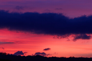 Sunset with colored cloudy sky